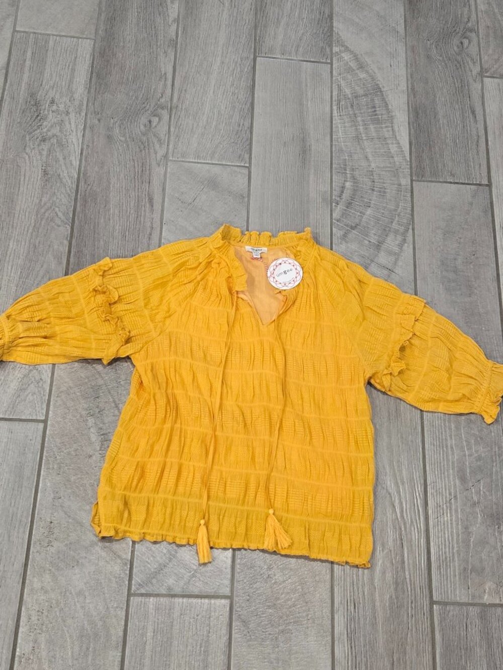 Umgee Women’s Textured Tassel‑Tie Blouse – Mustard Yellow – Size M